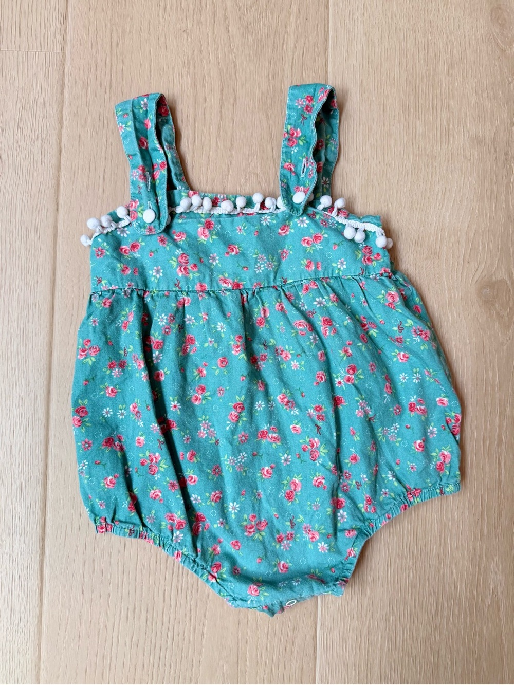 Tutu and Lulu Turquoise Floral Baby Romper with Pom Trim